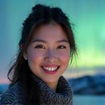 Portrait of Emily Chen, an Aurora Photography Specialist.
