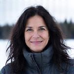 Portrait of Wildlife and Nightscape Photographer Dr. Anya Sharma