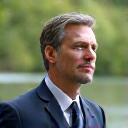 Portrait of Dr. Marcus Thorne, a distinguished looking man with a thoughtful expression